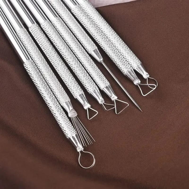 Herramientas metálicas de modelado para arcilla.