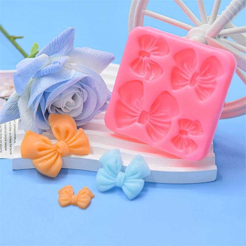 Molde de silicona con diseño LAZOS X 4 para uso en Velas, Jabones, resina, chocolate, porcelana fría.