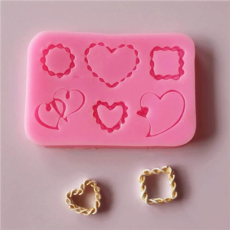 Molde CORAZONES X 6 elaborado en silicona para uso en chocolate, resina.