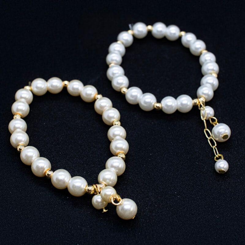 Pulsera Bebé Perla Cultivada Oro: Elegancia y Ternura