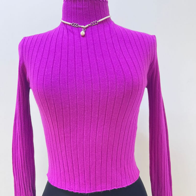Blusa de punto de color rosa