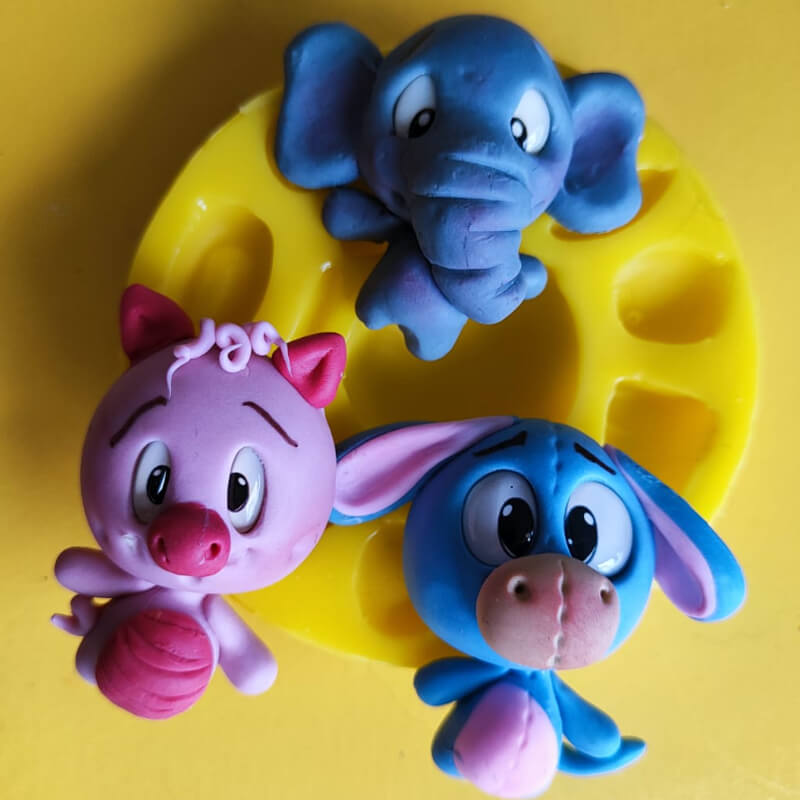 Molde de silicona de con varias opciones de animales para uso en porcelana fría.