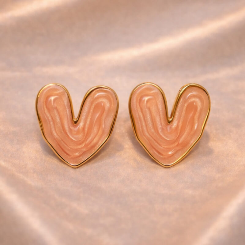 ARETES CORAZÓN COLOR ROSADO