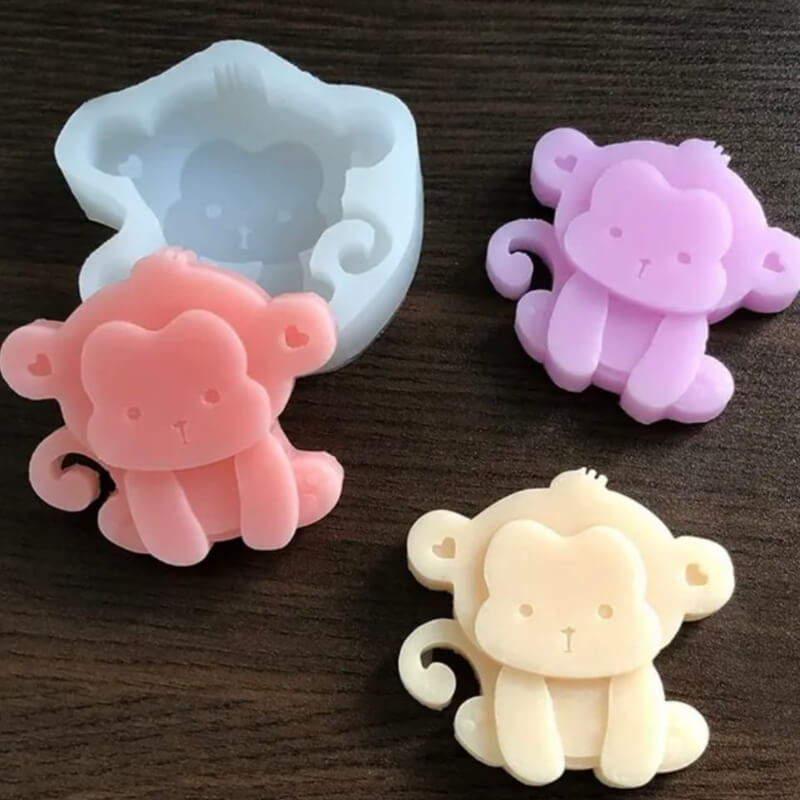 Molde elaborado en silicona con diseño de Mono cómico para uso en Velas.
