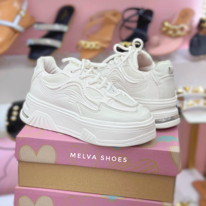 Sneakers Capellada Blancos con Mini Cápsula.