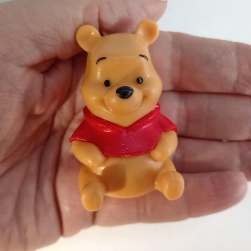 Winnie the Pooh sentado