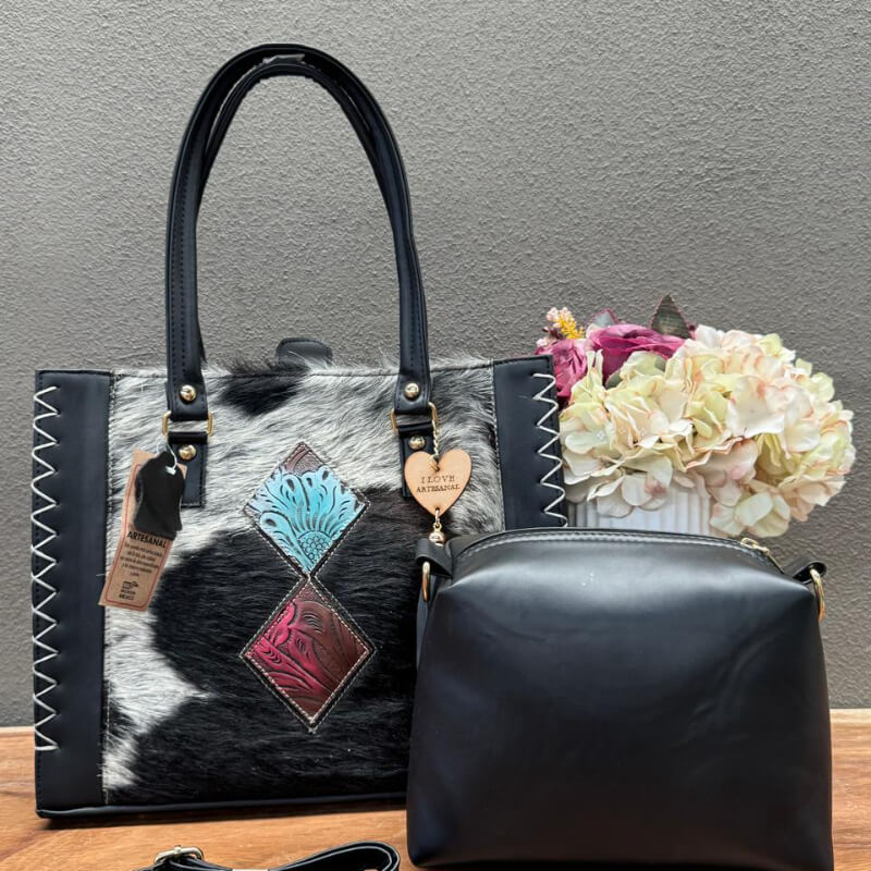 Bolso en piel con pelo corte vacuno incluye cosmetiquera y correa