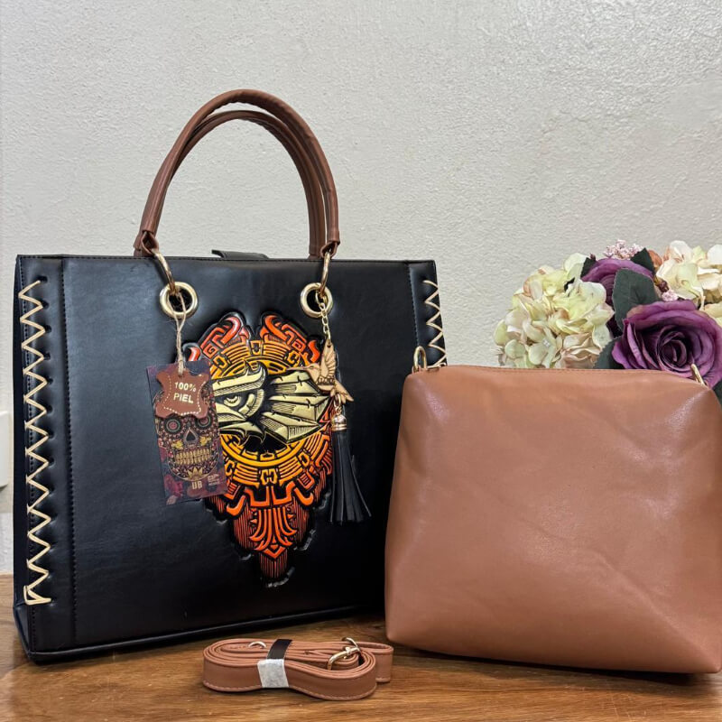 Bolso en piel corte vacuno incluye cosmetiquera y correa